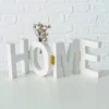 Schriftzug sortiert HOME
